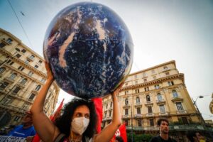 Demonstrators protest against the G-20 climate meeting in Naples, Italy, on July 22, 2021.