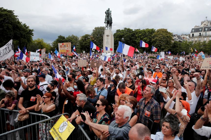 Protesters attend a demonstration against France's restrictions to fight the Covid-19 outbreak, at the Trocadero Square in Paris, France, July 24, 2021.