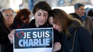 People pay tribute to the victims of the satirical newspaper "Charlie Hebdo", in Marseille, southern France, Thursday, Jan. 8, 2015. Pic: AP